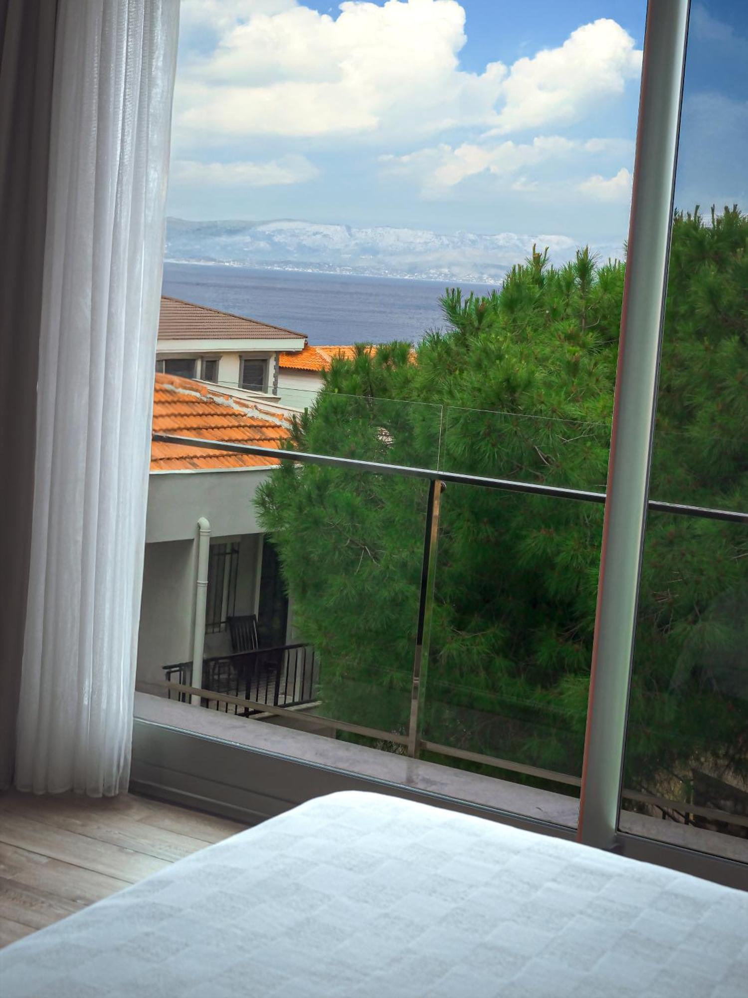 Sahil Butik Otel Кешме Экстерьер фото