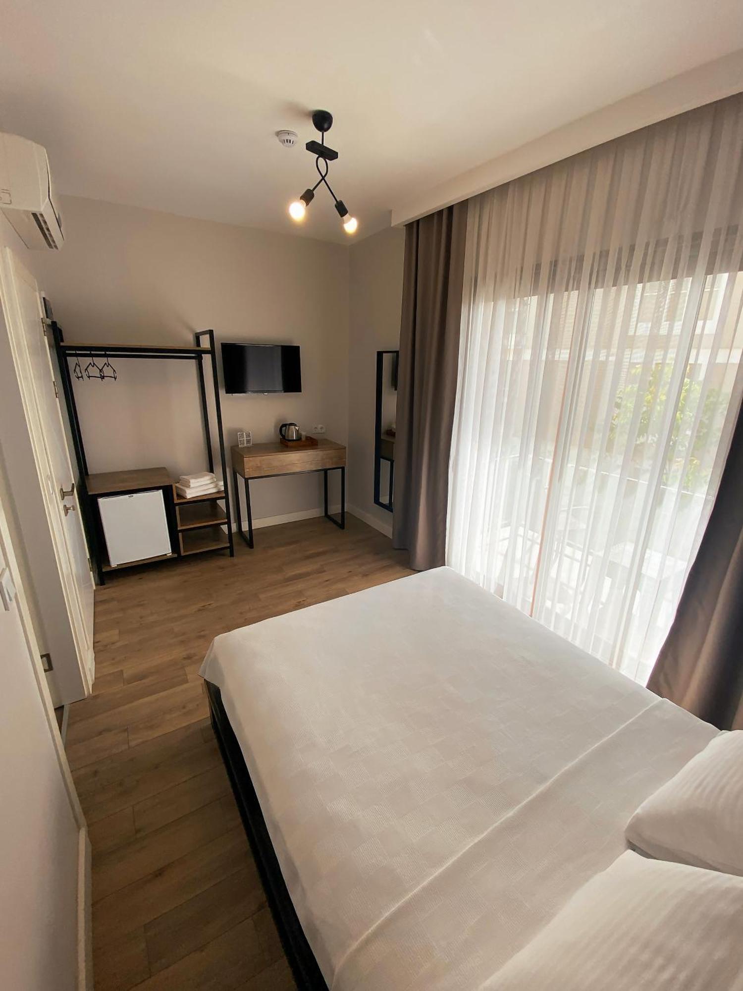Sahil Butik Otel Кешме Экстерьер фото