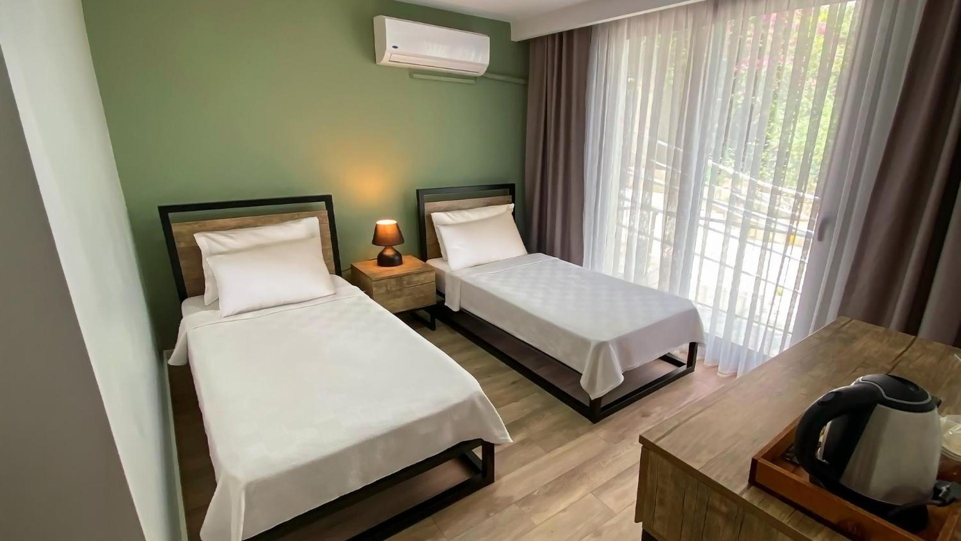 Sahil Butik Otel Кешме Экстерьер фото